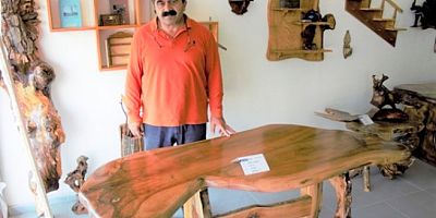 Kurt figürlü masa 600 bin TL.